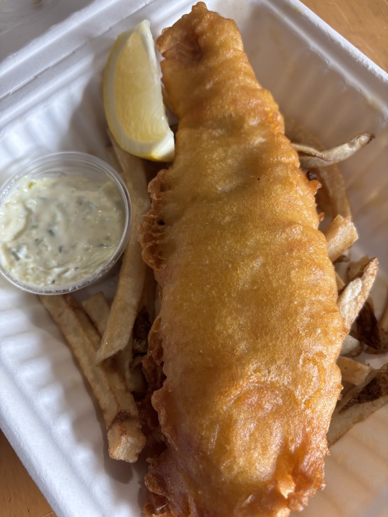 Sammies hand-battered pollock and fresh-cut chips being prepared